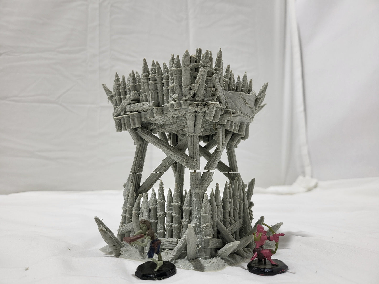 Orc Lookout Tower for tabletop wargaming with a rickety wooden platform, thick log supports, ladders, and spiked fortifications. Perfect for orc camps and strategic outposts in Warhammer, D&D, Pathfinder, and Bolt Action.