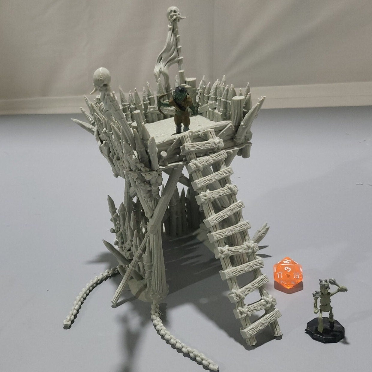 Orc Lookout Tower for tabletop wargaming with a rickety wooden platform, thick log supports, ladders, and spiked fortifications. Perfect for orc camps and strategic outposts in Warhammer, D&D, Pathfinder, and Bolt Action.