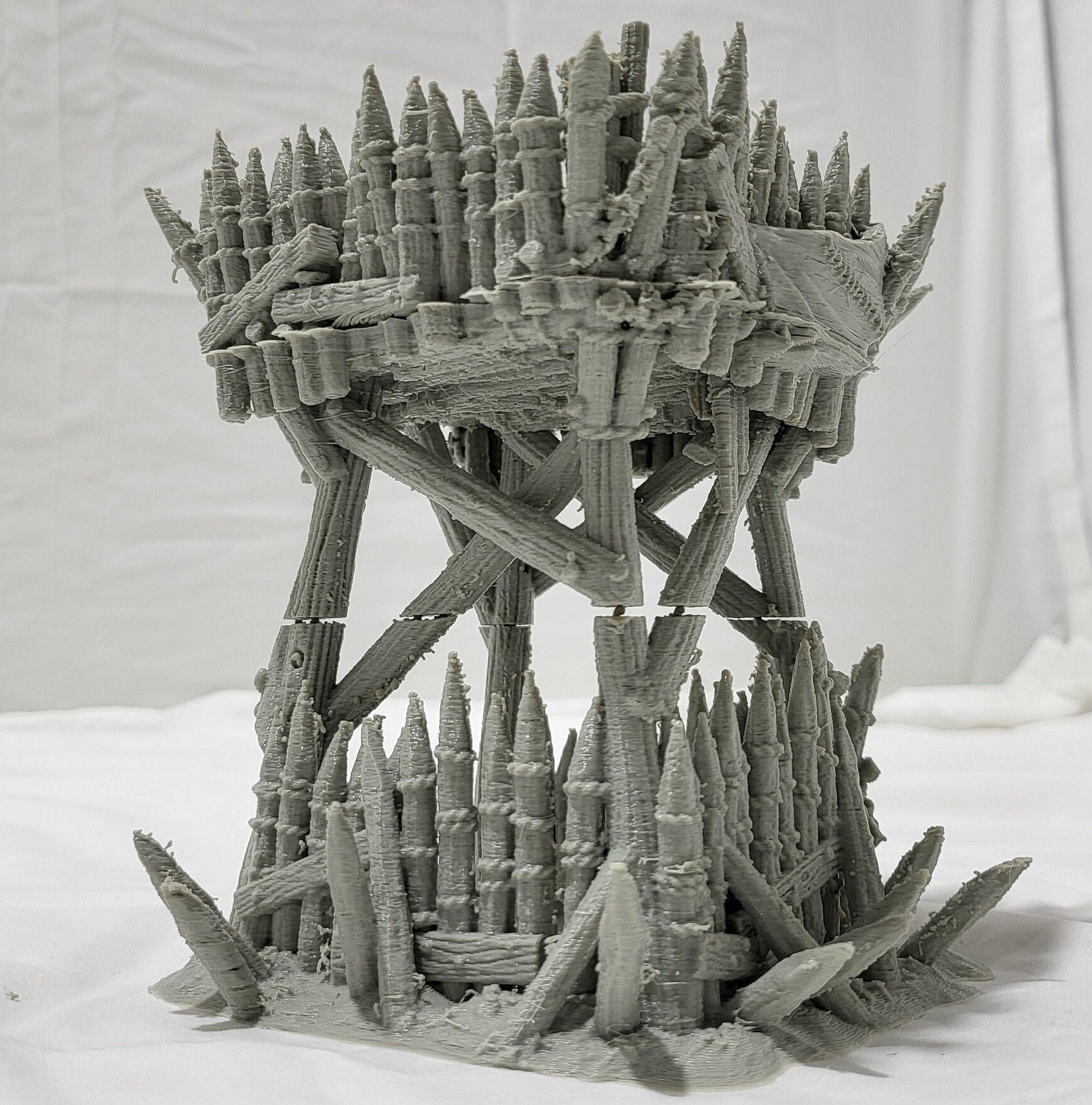 Orc Lookout Tower for tabletop wargaming with a rickety wooden platform, thick log supports, ladders, and spiked fortifications. Perfect for orc camps and strategic outposts in Warhammer, D&D, Pathfinder, and Bolt Action.