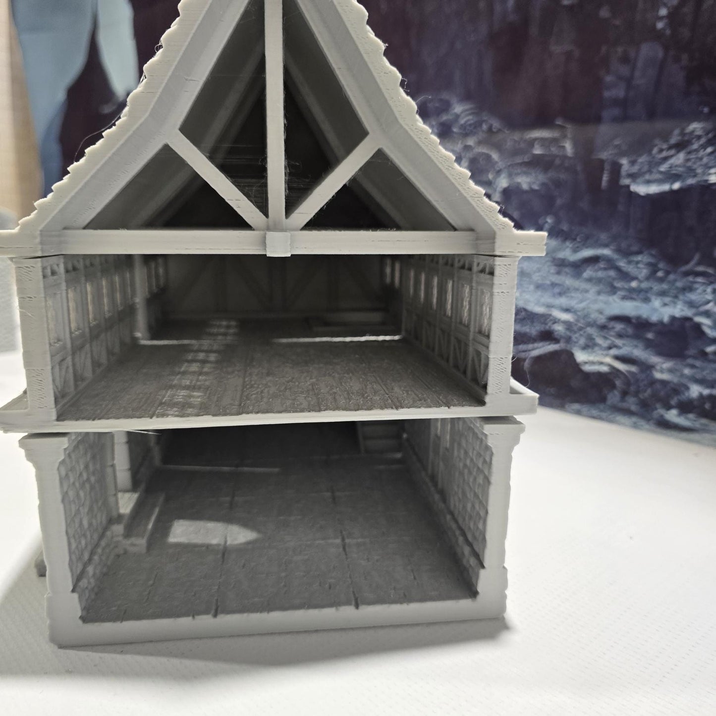 A detailed 3D-printed model of a modular warehouse for tabletop RPGs like DnD and Pathfinder. Features include brick walls, metal beams, storage crates, shelving units, and broken machinery. Perfect for urban and industrial gaming scenarios