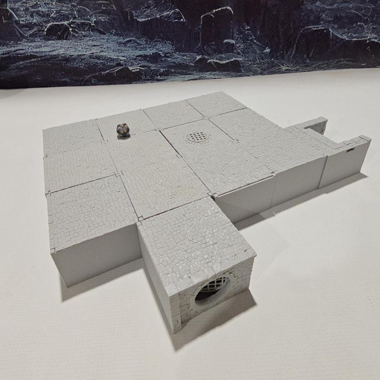 Detailed 3D-printed Ancrabourg Sewer System set for tabletop RPGs like DnD and Pathfinder. Features include intricate stone walls, water entries, manholes, and connecting tunnels. Ideal for adding depth and immersion to underground and sewer