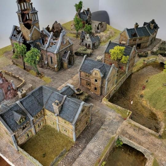 The modular building set includes a variety of stone-textured pieces with options for windows, doors, and roofs, allowing for the construction of up to nine distinct medieval-style buildings, perfect for creating immersive tabletop scenarios.