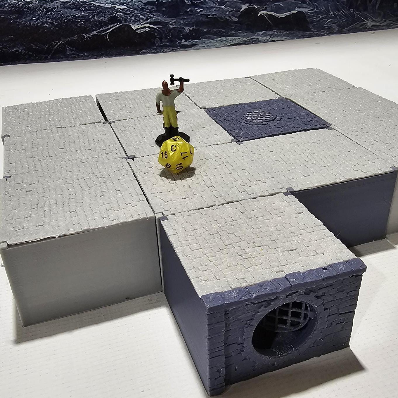 Detailed 3D-printed Ancrabourg Sewer System set for tabletop RPGs like DnD and Pathfinder. Features include intricate stone walls, water entries, manholes, and connecting tunnels. Ideal for adding depth and immersion to underground and sewer