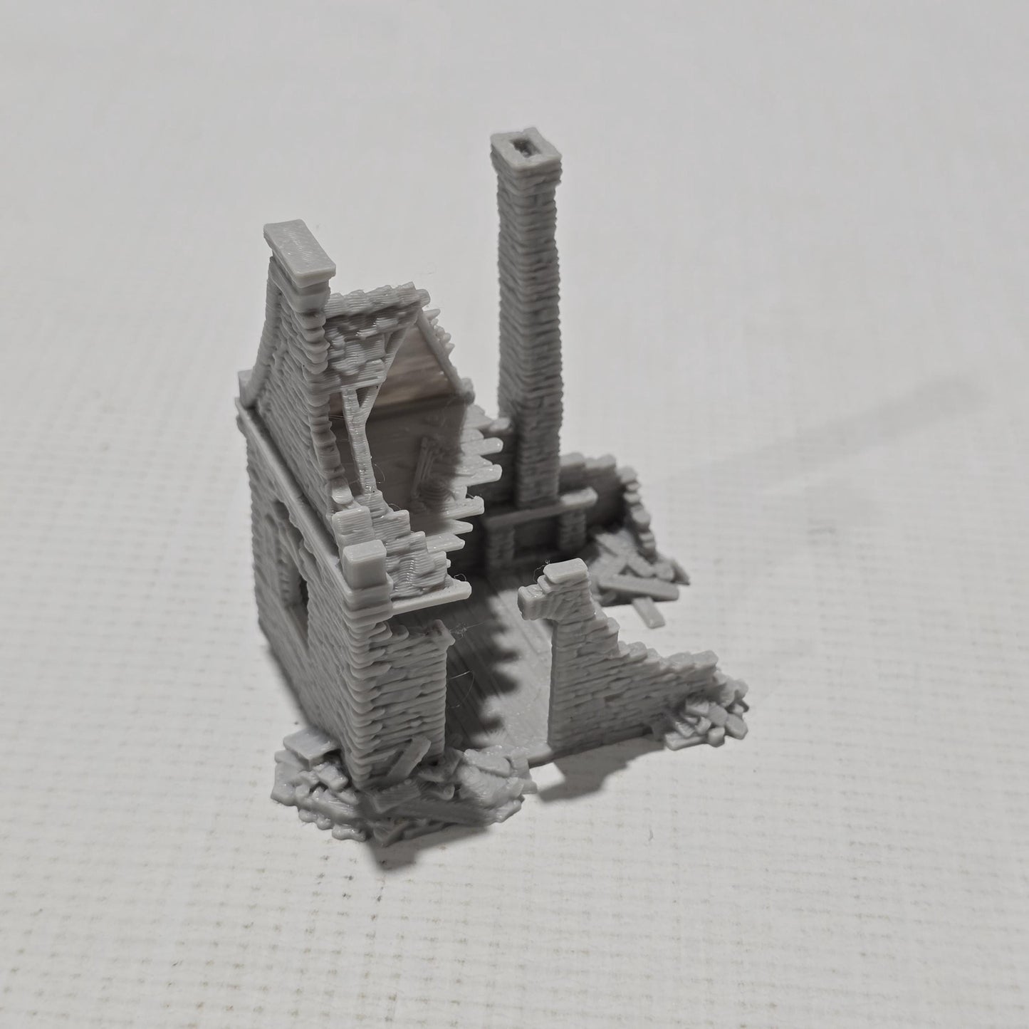 Grimdale Steele Residence Ruin for tabletop wargaming, ruined residence, DnD, Pathfinder, Bolt Action, Revolutionary War games, 3D printed PLA terrain, high-quality ruins, realistic textures, strategic gameplay, RPG scenery.