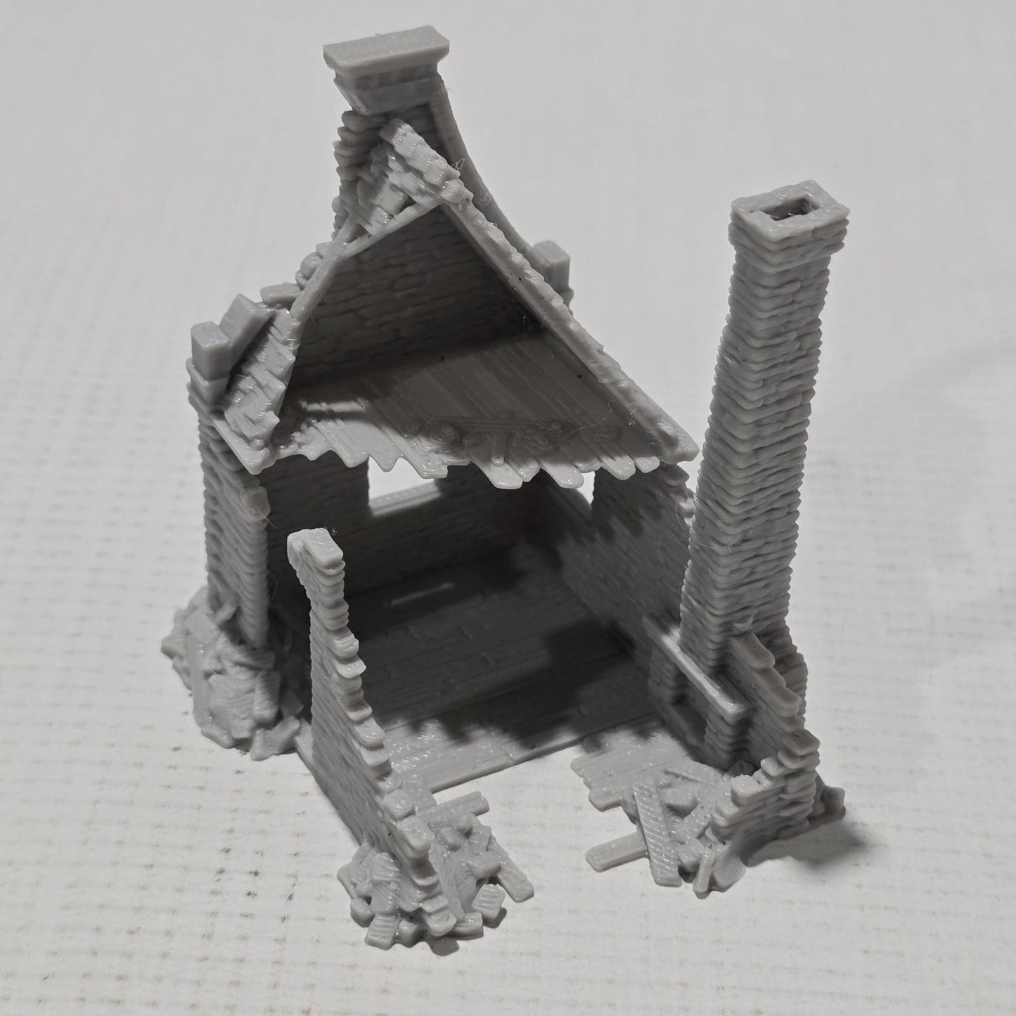 Grimdale Steele Residence Ruin for tabletop wargaming, ruined residence, DnD, Pathfinder, Bolt Action, Revolutionary War games, 3D printed PLA terrain, high-quality ruins, realistic textures, strategic gameplay, RPG scenery.