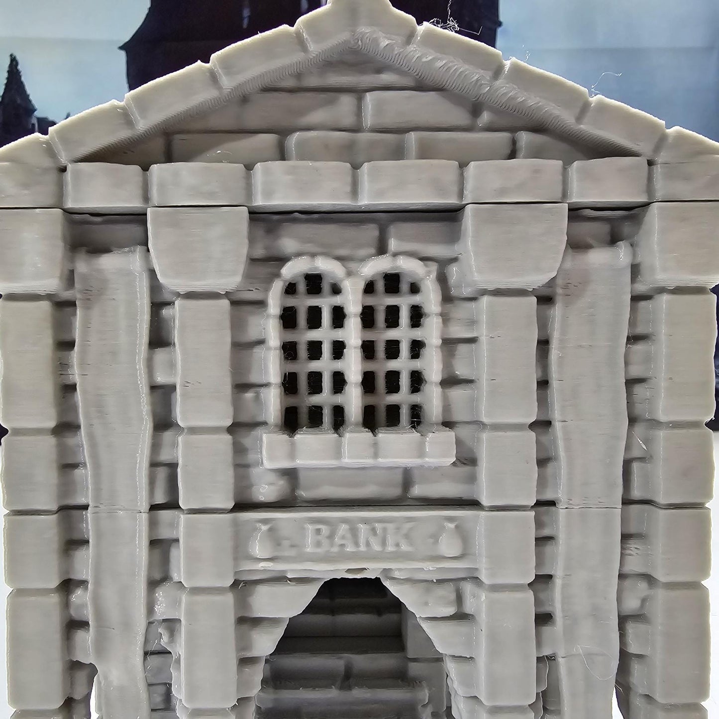 Detailed 3D-printed medieval city bank with stone walls, ornate columns, and banking hall, perfect for tabletop RPGs like Dungeons & Dragons and Pathfinder.