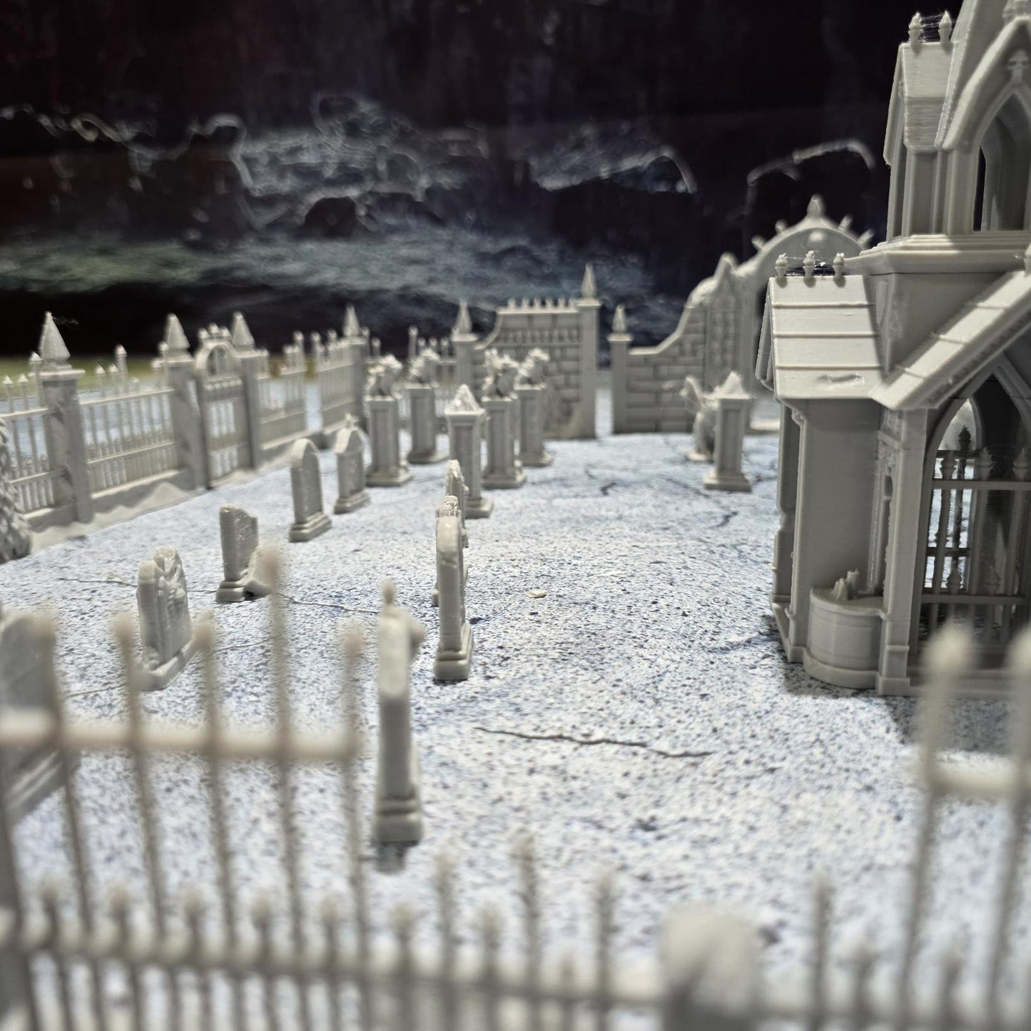 Explore the 19th-century Gothic revival with our Large Cemetery Set, featuring a chapel, 26 gravestones, gargoyles, and more for tabletop RPGs