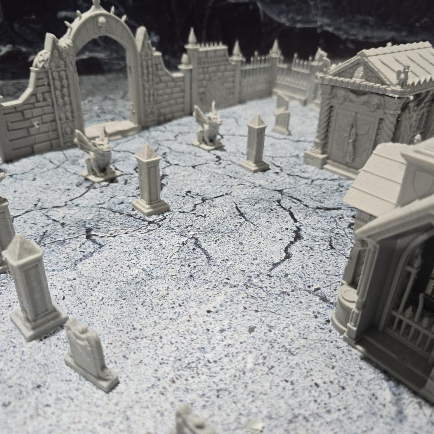 Explore the 19th-century Gothic revival with our Large Cemetery Set, featuring a chapel, 26 gravestones, gargoyles, and more for tabletop RPGs