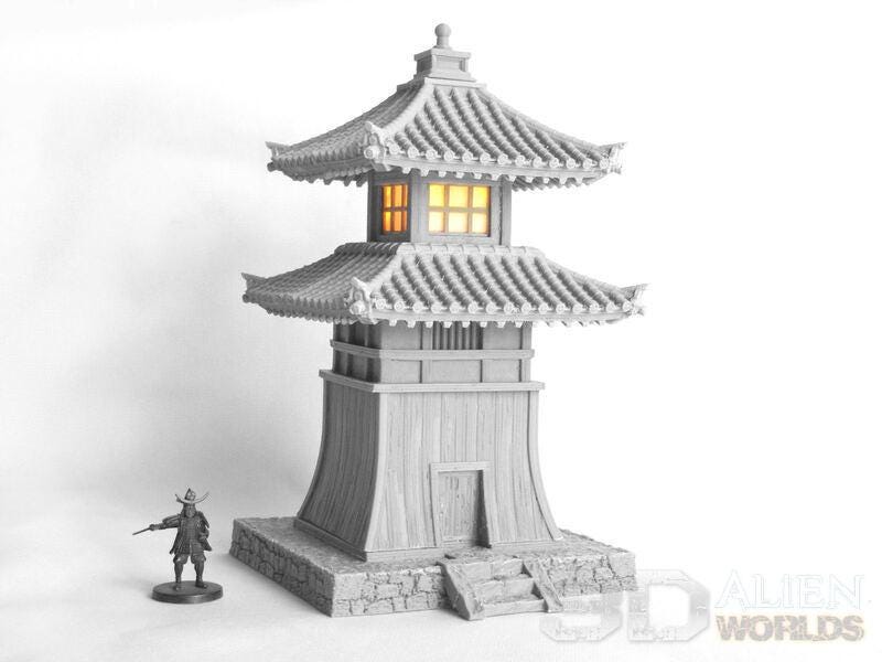 This beautifully detailed Samurai Lighthouse features a traditional pagoda-style roof with illuminated windows and a stone foundation, ideal for historical and fantasy tabletop games, enhancing gameplay with authentic Japanese architecture