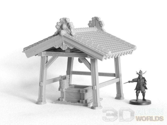 A detailed model of a Samurai Lord’s Well from Feudal Japan, featuring intricate wooden beams, a traditional Japanese tiled roof, and a stone basin. Perfect for tabletop RPGs and wargames with a Feudal Japanese theme.