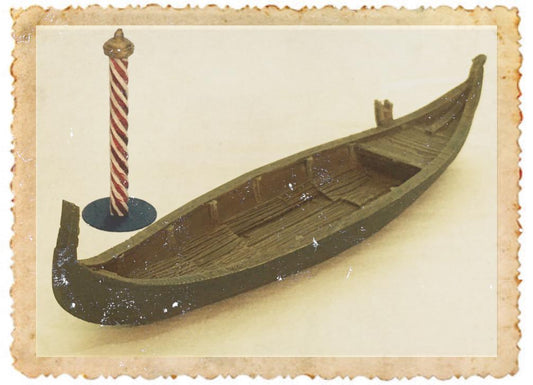 Navigate the charm of Venice with this beautifully handcrafted Venetian Gondola model, complete with a traditional striped mooring pole, perfect for collectors and diorama makers alike